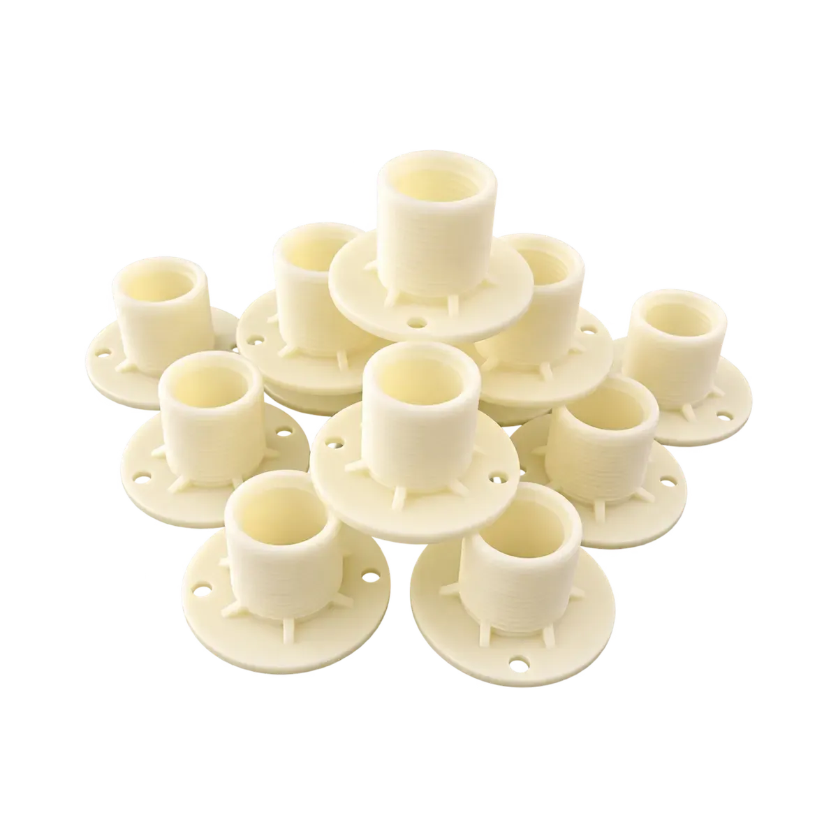 Several cream-coloured socket-style pipe fittings with round flanges and mounting holes.
