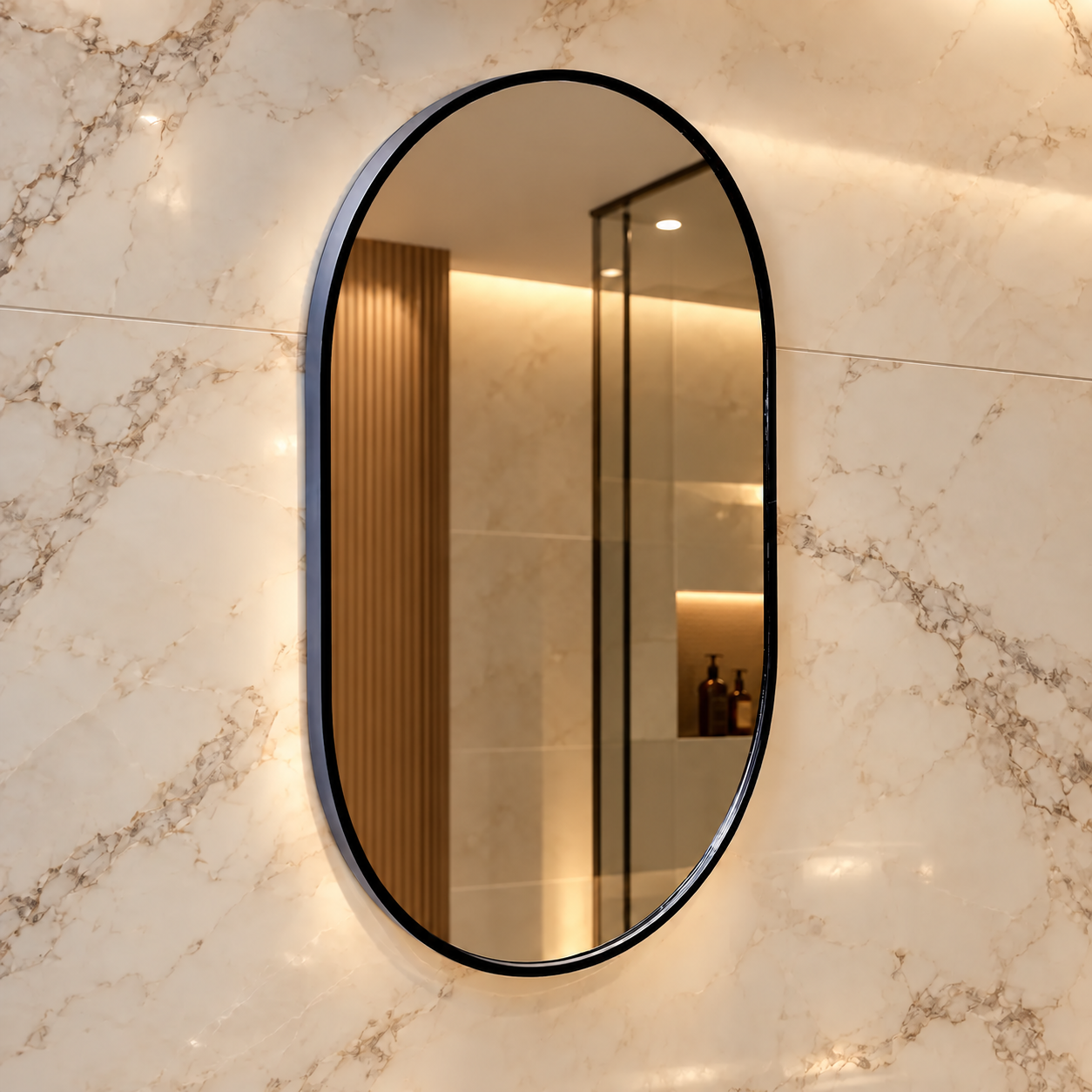 Oval black bathroom mirror; reflected bottles without company branding